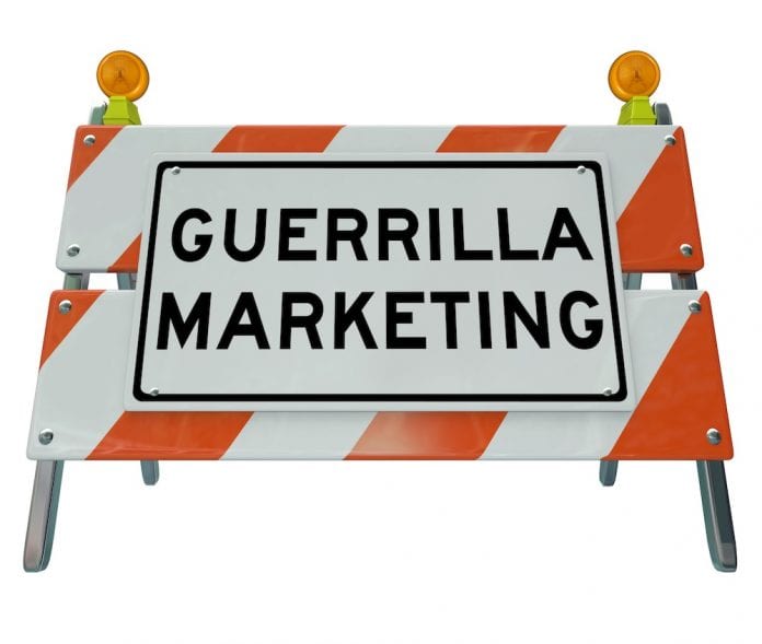 Guerrilla Marketing Sign Barrier Barricade Words