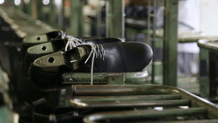videoblocks-manufacturing-shoes-in-a-shoe-factory_h6awnd7yw_thumbnail-full01