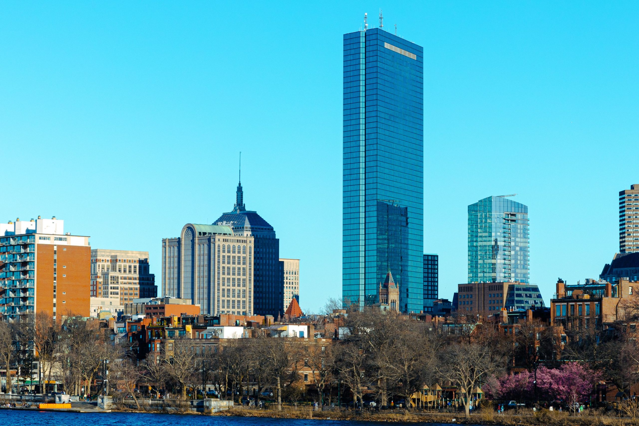 What Boston Business Owners Can Learn From High-Performing Workplaces Boston skyline featuring the John Hancock Tower and modern architecture at day